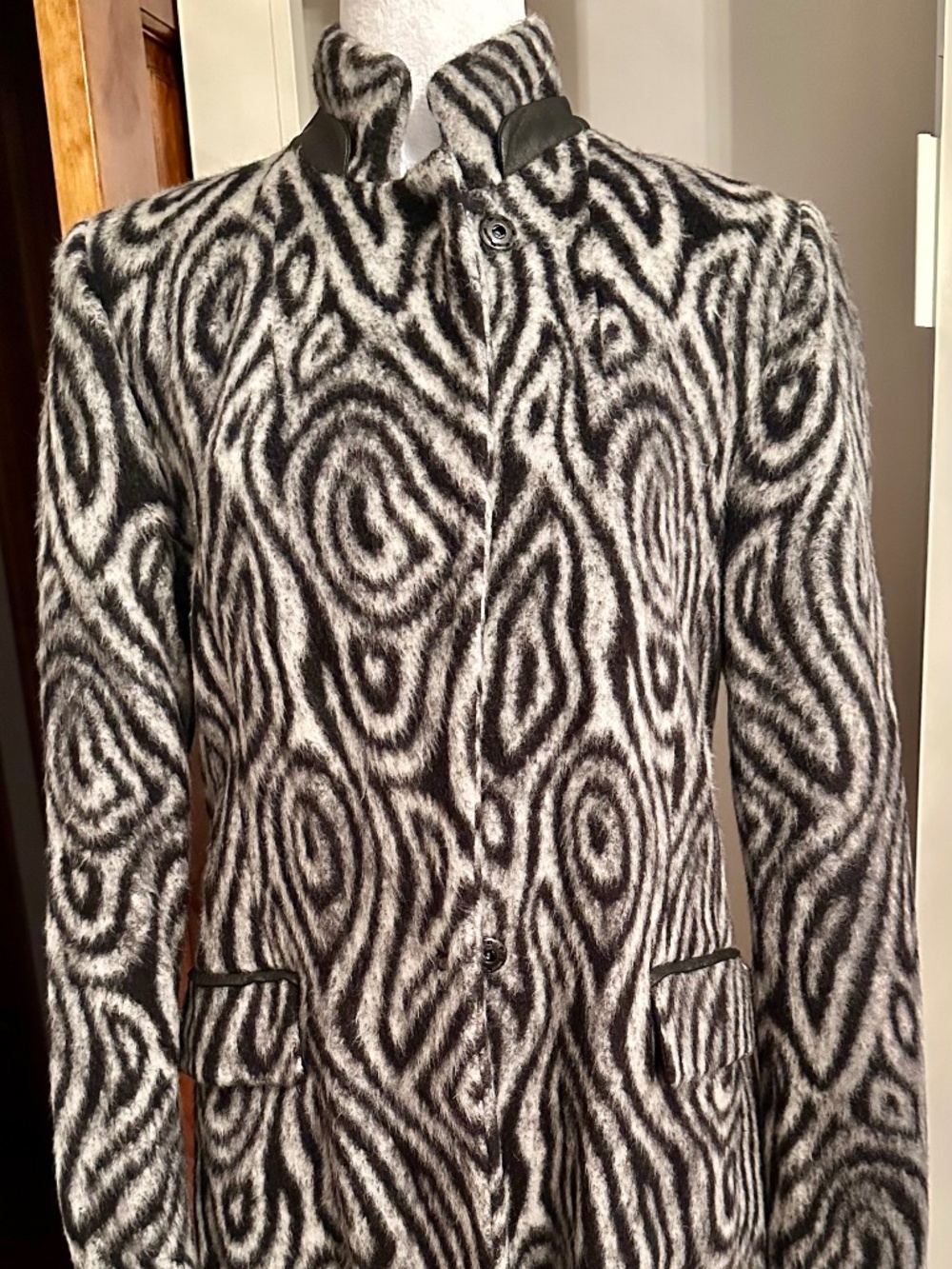Anna Rita N. Black and white abstract swirl pattern wool coat with leather colla